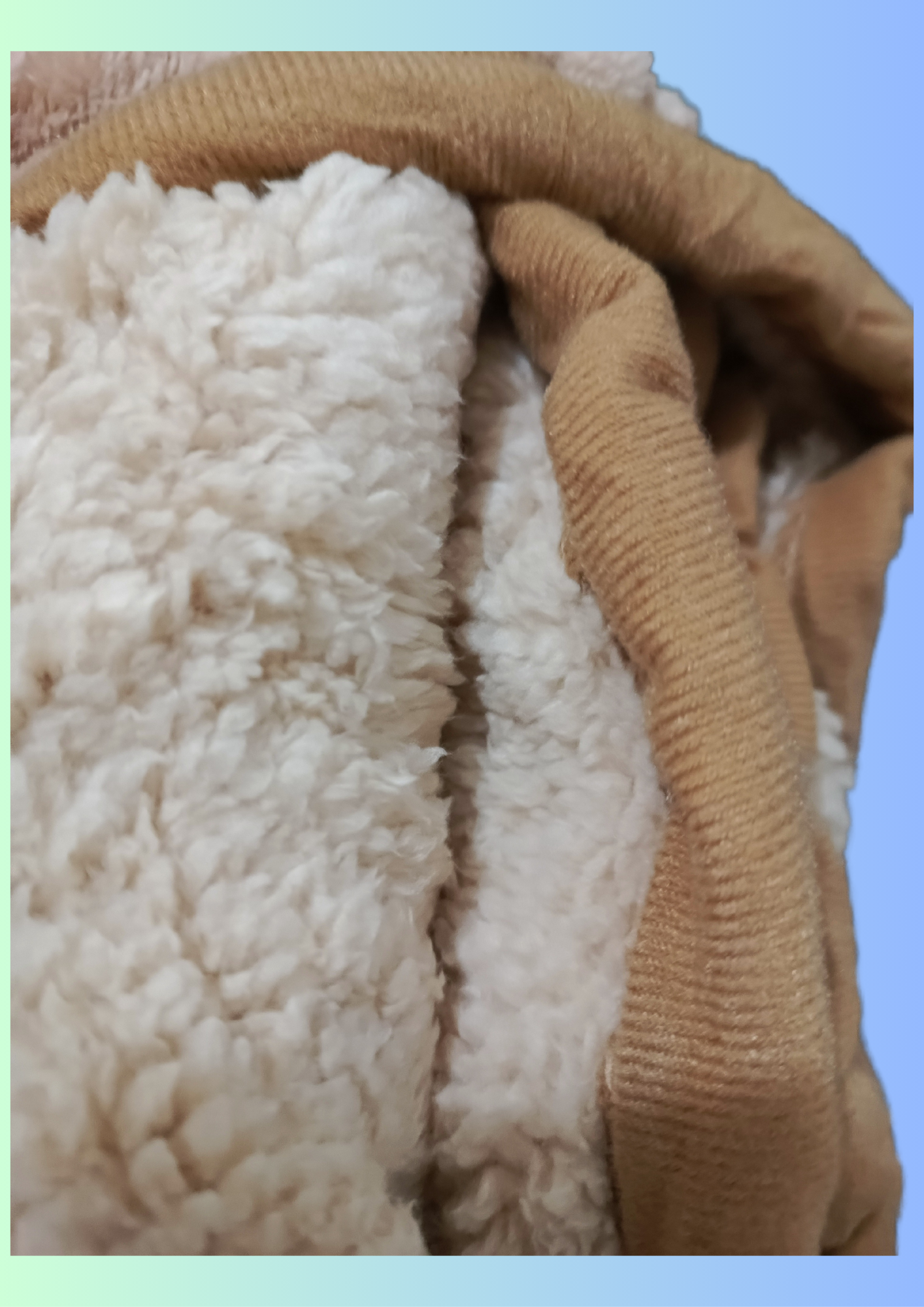 Manta símil piel con corderito